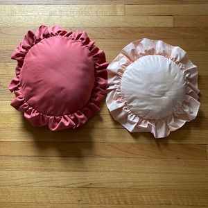 2 pink round vintage throw pillows
